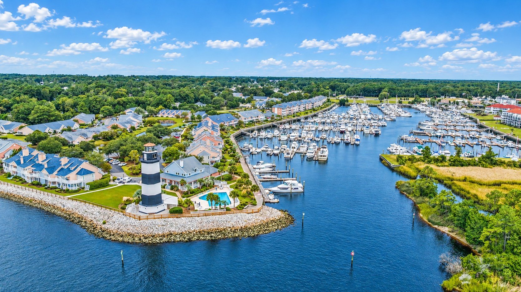The lighthouse and marina on the waterway at Little River